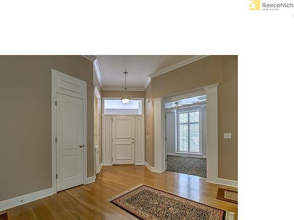 Looking at front door. Room adjacent is the office.