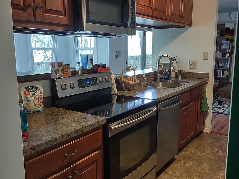 This photo has not been altered in any way: no edits or filters have been applied to try to deceive the viewer by having the room appear larger or brighter than it actually is.