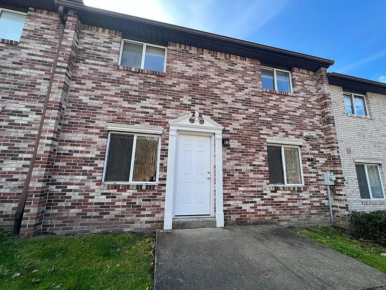 Townhome Exterior w/ Patio Area