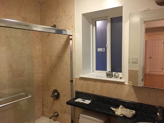 Bathroom with shower tub combo
