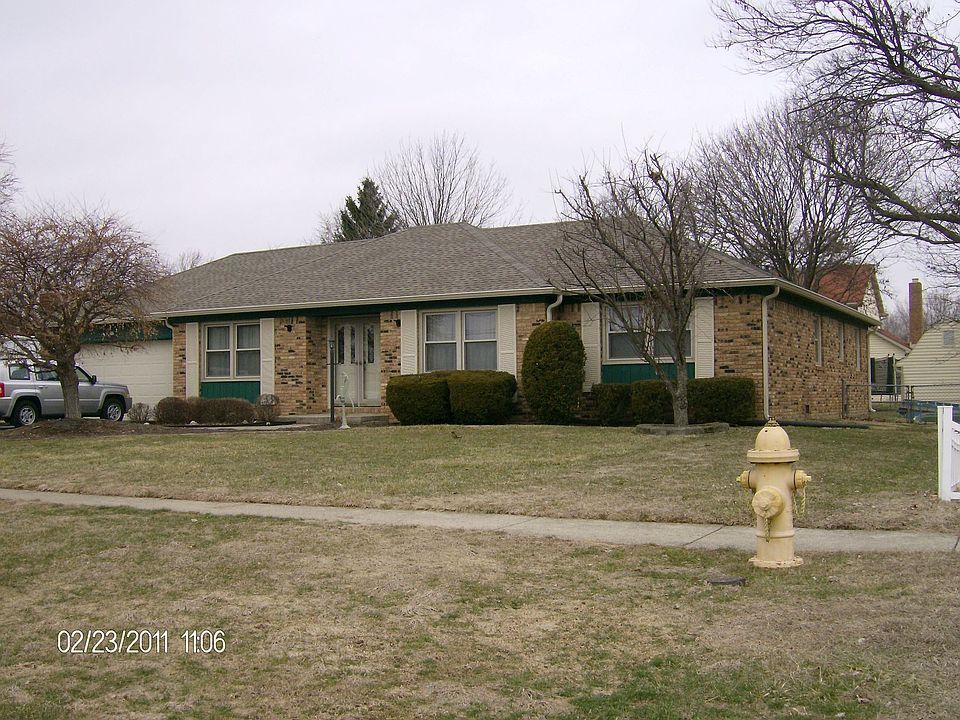 Spacioous brick home with enclosed sun porch
