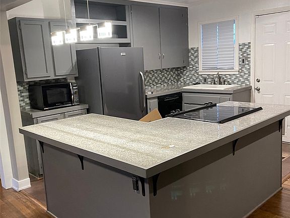 5th image of 4966 S Madison Ave