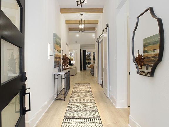 foyer with beam ceiling