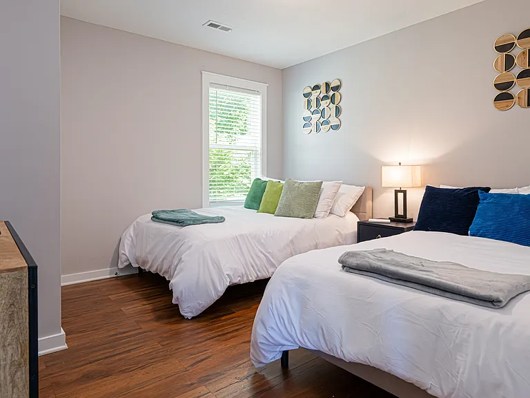 Third Bedroom With Two Full Beds & Smart TV
