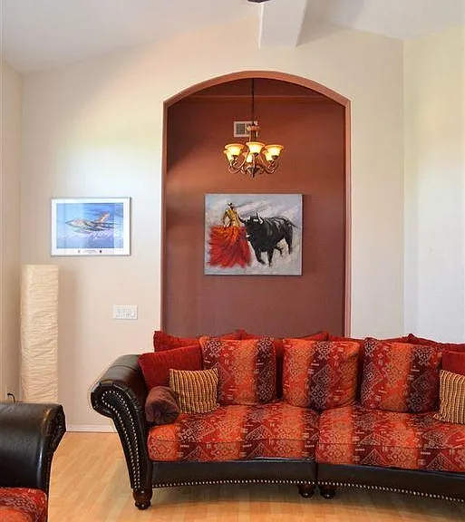 Living Room with gas fireplace, recessed lighting, surround sound hook-ups, and cathedral ceiling.