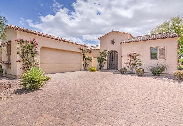 Front of house and detached 2 car garage