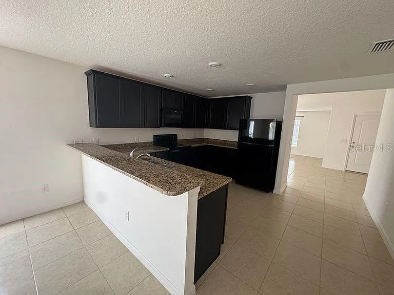 6909 Crested Orchid Dr — Photo 3