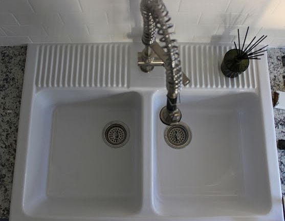 Large kitchen farm sink and new cabinets