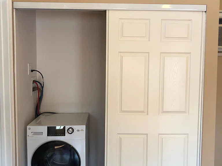 Brand new GE washer-dryer in unit