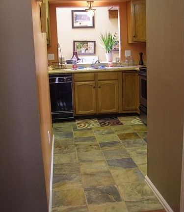 tile floor in kitchen, stainless steel applicances stay