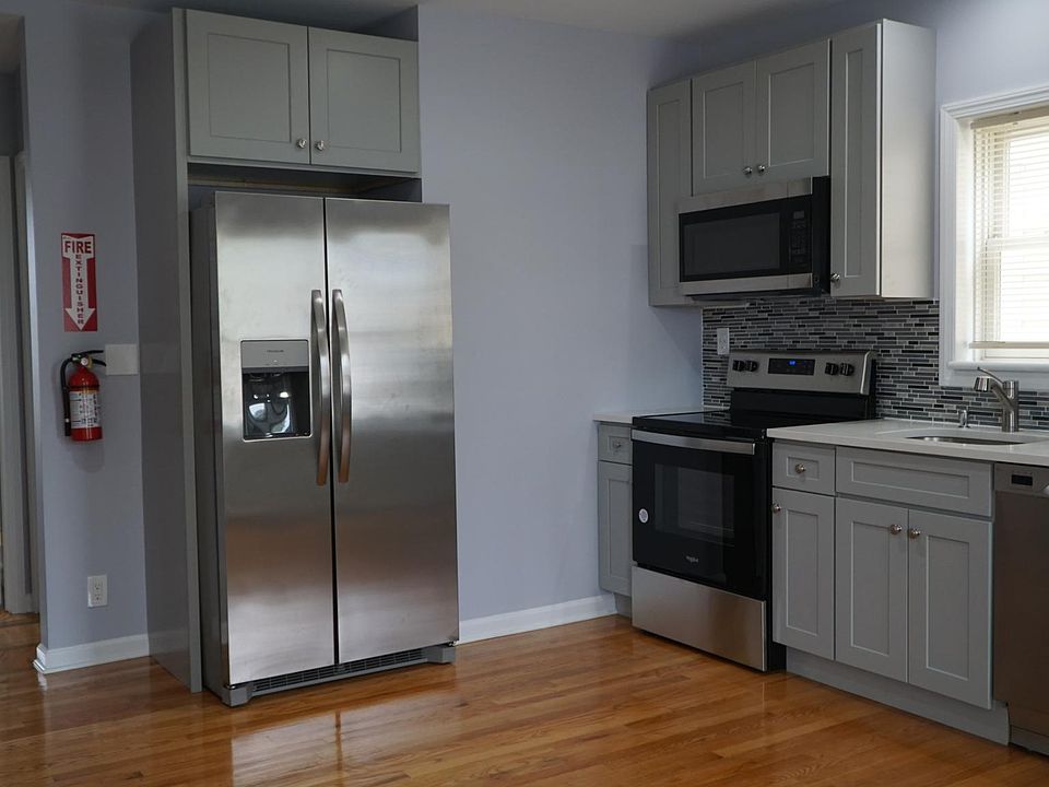 Left side of kitchen.