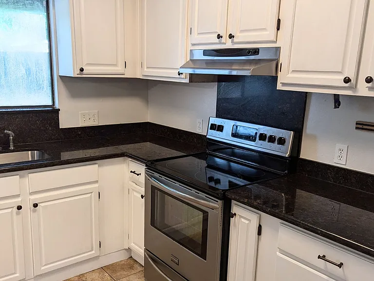 7935 Dartmoor Dr — Photo 3