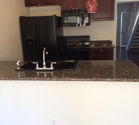 Upgraded Kitchen which includes Refrigerator, Microwave, Stove and Oven