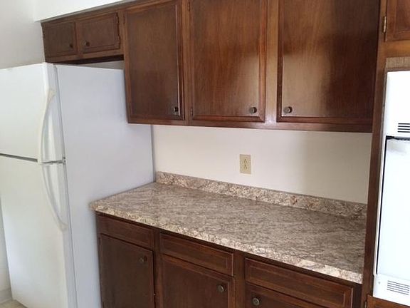 Maple kitchen cabinets and laminate countertops