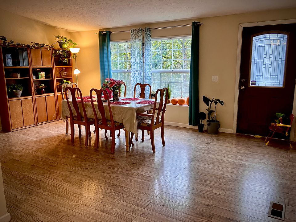 Dining area. Table and chairs available with rental.