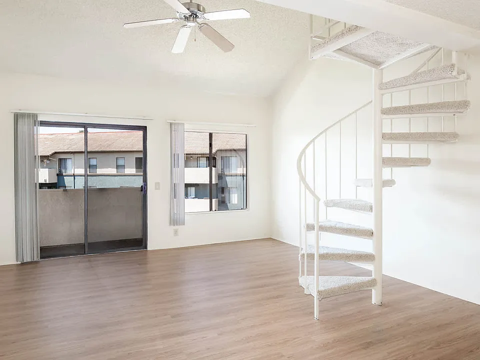 Living Room with Balcony and Hard Surface Flooring