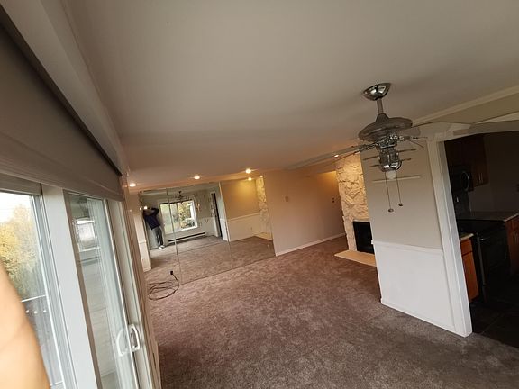 Very large living room top floor, views of Lake Washing from window on two sides of the building.