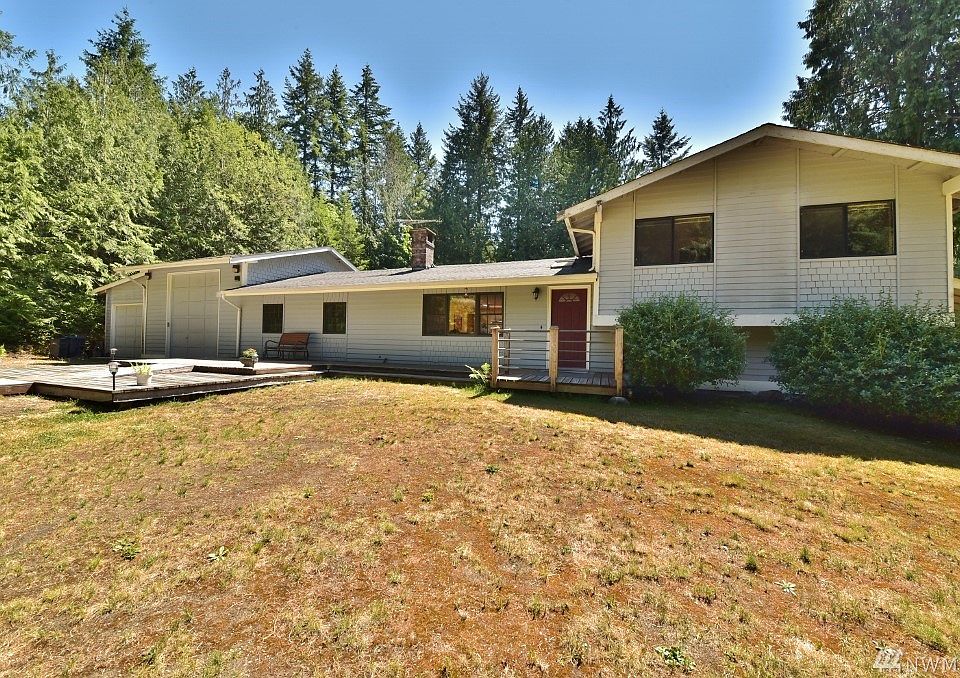 Front of main house. Handicap accessible (ADA ramp) on a 2.3 acre park like private tree lined property. Cottage is ADA accessible as well.