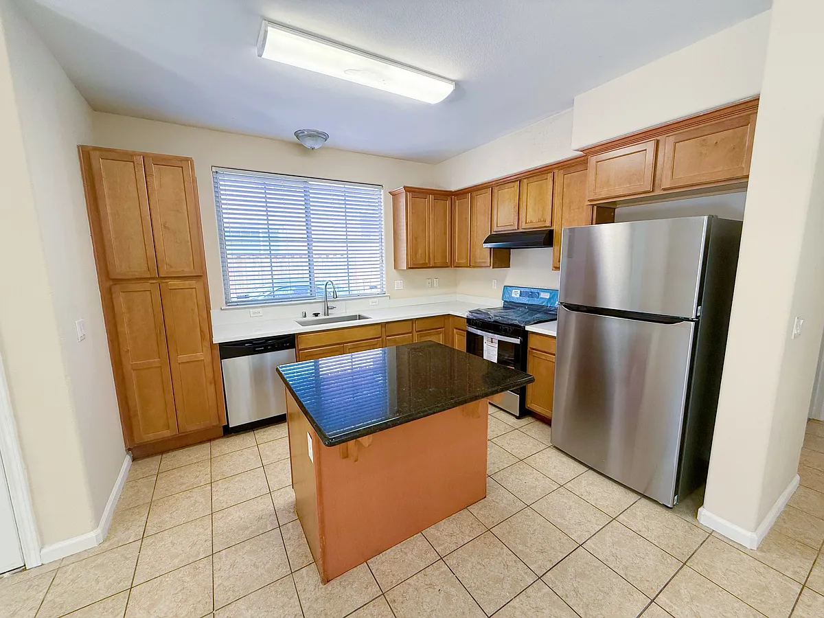 Spacious kitchen with new countertop, sink, faucets, all appliances are brand new! - 2225 Versailles St