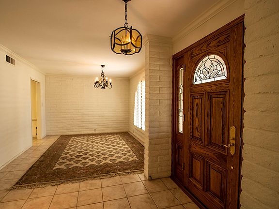 Front entry and formal dining room
