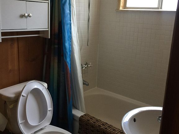 Full bathroom with tub