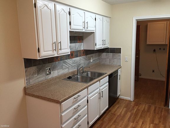 Beautiful new kitchen with marble tile ceramic backsplash