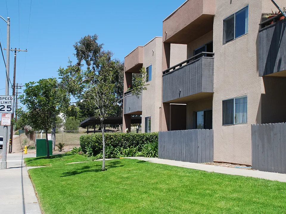 Lawns and gardens in front of Villa Pacific Apartments in Oceanside, California.