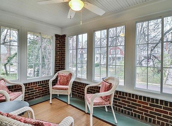 The foyer/sun room has a tongue and groove vinyl bead board ceiling and removable insulated windows and screens - perfect space to greet guests and to get away from it all