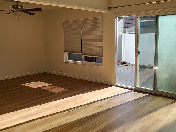 Living room with view of private patio