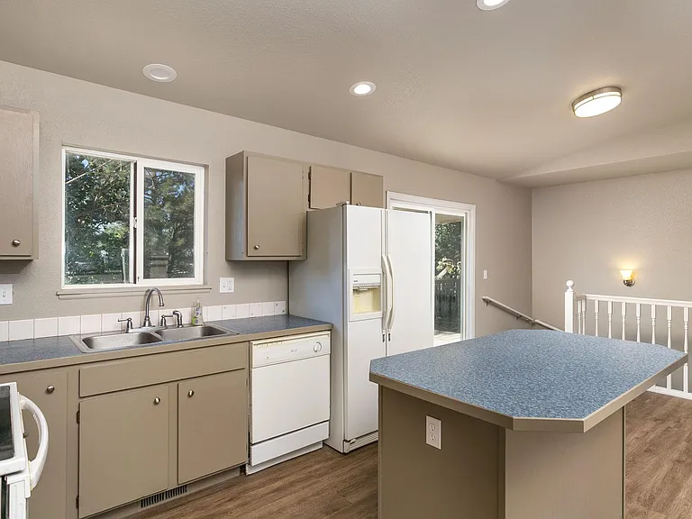 Fresh paint and new LVP flooring throughout the home