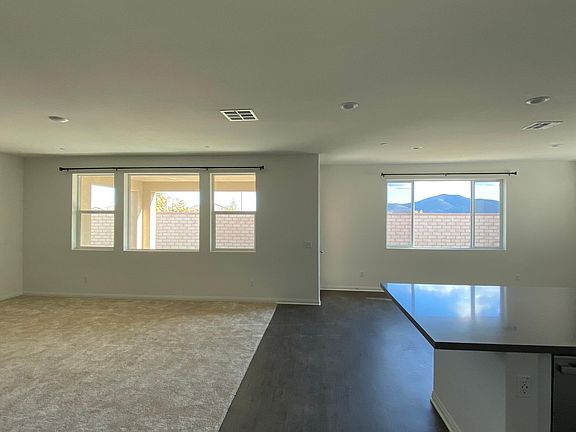 Bright and Spacious great room with hill views at the backyard