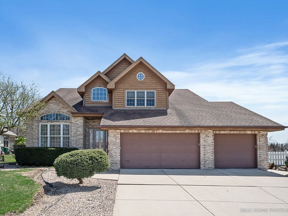 2 Story Custom Built 4 bedroom 2 1/2 bath  Home Full Basement w/roughed in plumbing for add'l bath3 Car Oversized Heated Garage with 2 drains.