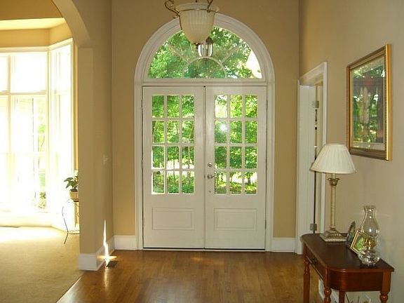 An elegant entry foyer with hardwood flooring you will surely love.