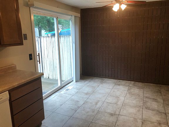 Eat-in kitchen with slider to backyard