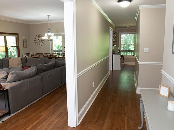 Front entrance hallway between living room and kitchen and Master bedroom on main floor.