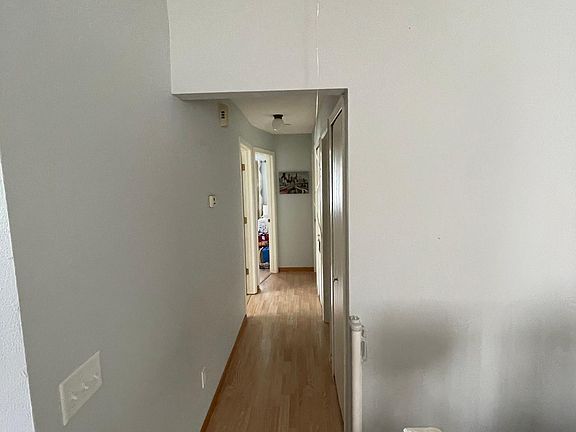 Upper level. Hallway between 3 bedrooms and full bathroom