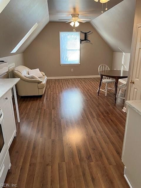 View from top of stairs into living space