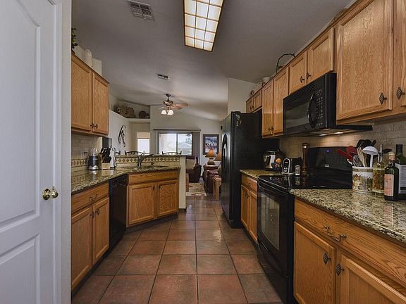 5th image of 7897 W School Hill Pl