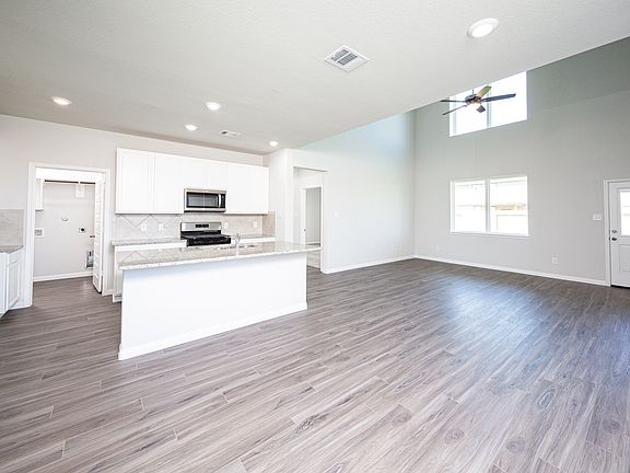 Dining Area to Kitchen and Family Room