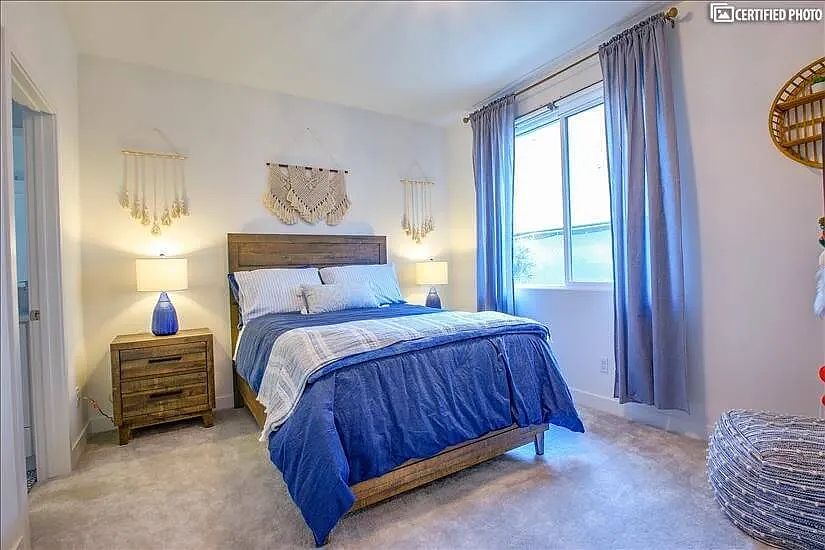 Main level bedroom w/ private bathroom