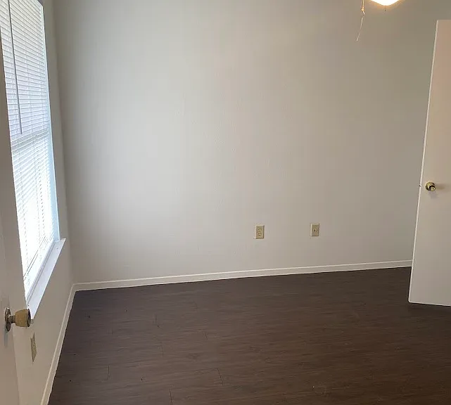 Bedroom window with fan and light