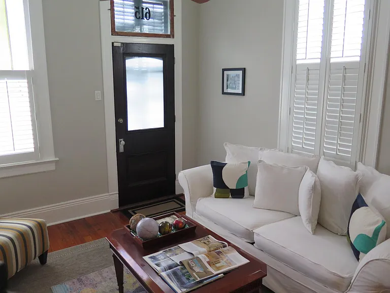 Original front door - yes this entry is 110 years old. If this door could talk! The room is best described as cozy-sophisticated.