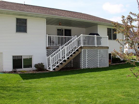 Back of the house : Deck with storage beneath. .