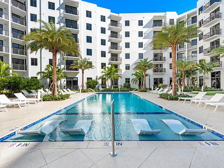 Cool off or lounge poolside in a serene courtyard retreat.