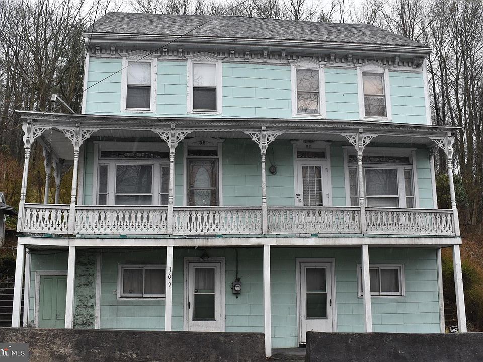 1st image of 309 & 311 Mount Olive Blvd