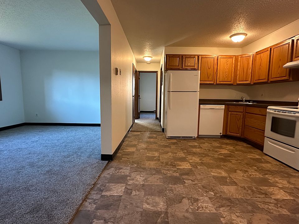 Wide angle of kitchen and living room