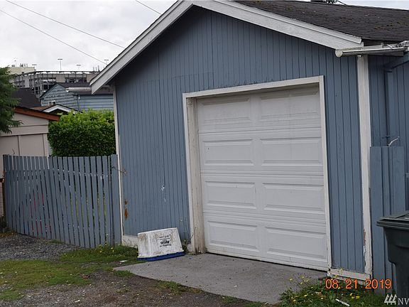 Solid 1 car garage with opener and concrete floor.  Room alongside for boat or RV?