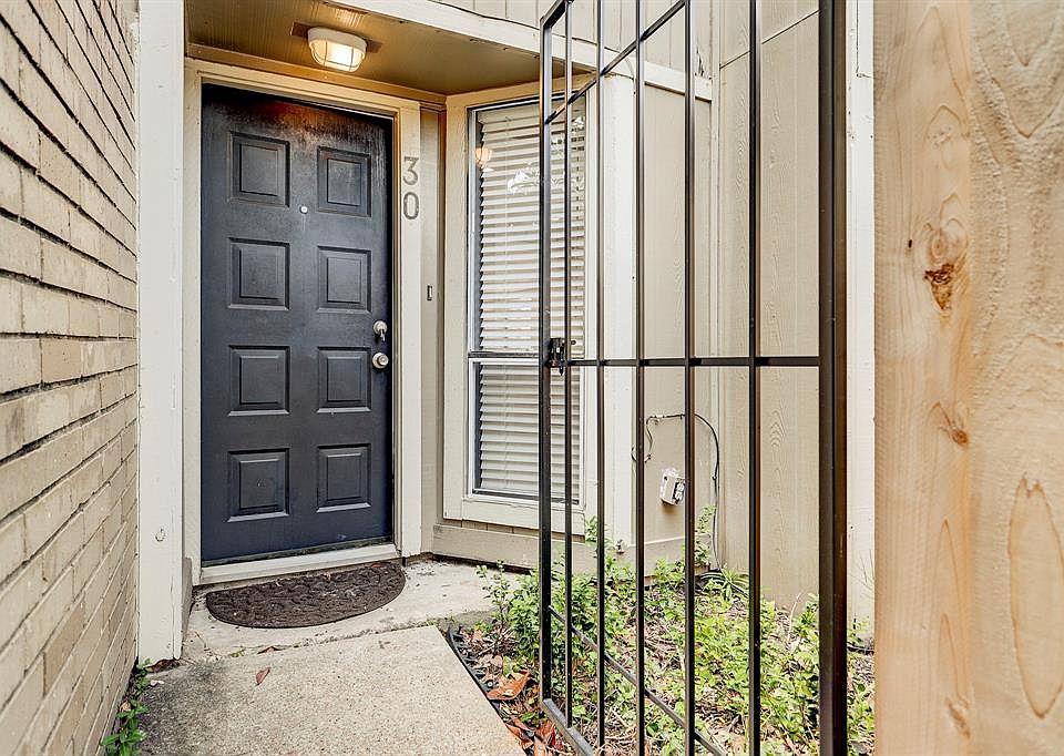 The iron gated entry to the front door area has a slide bolt closure which can be locked with a pad lock for extra security or to be sure your dog doe