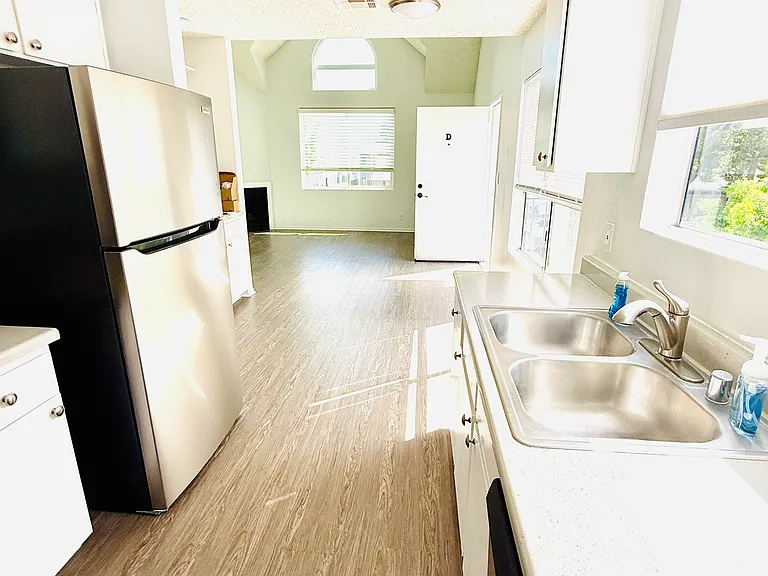 View of kitchen and living room