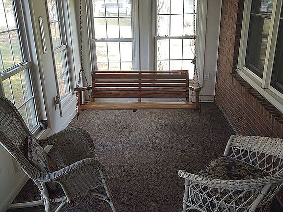 Sunroom with swing